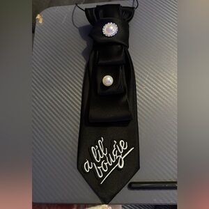 Elegant Black Tie with Pearl Accents